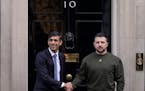 Britain’s Prime Minister Rishi Sunak, left, welcomes Ukraine’s President Volodymyr Zelenskyy at Downing Street in London on Wednesday.