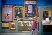 Hazel Selb, 2, explores a piece modeled after Leonardo da Vinci’s “Mona Lisa,” at the Minnesota Children’s Museum in St. Paul, Minn., on Tuesd
