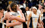 Marquette’s Jordan King hugged Chloe Marotta after defeating Connecticut on Wednesday night.