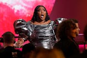 After hearing her name called for record of the year, Lizzo brings perspective to the Grammys.
