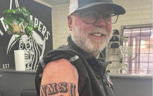 Jerry Kill got his first tattoo on Sunday, and nobody will forget it.
