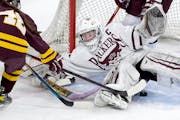 South St. Paul goalie Delaney Norman sprawled to make a save in the second period against Fergus Falls.