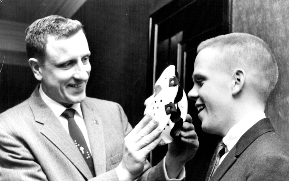 Before he was “Badger,” Bob Johnson coached Roosevelt high school hockey and showed his goalie, Eric Knox, how to wear his mask ahead of the 1961 