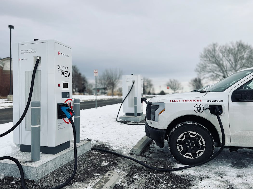 An Xcel vehicle charges up at one of the utility’s charging stations in Colorado. The utility plans a public network of 730 chargers in Minnesota.