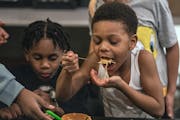 Jo’mari Robinson, 5, digs into the ramen bowl in Minneapolis, on Thursday, March 2. This is the first class of the Active Chefs free cooking program