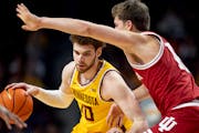 Jamison Battle was one of three seniors honored Sunday after the Gophers-Wisconsin basketball game at Williams Arena. Battle still has one year of eli