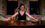 Isabel Nelson invites audiences to a “Feast,” a Walking Shadow production at the Black Forest Inn. The show runs through April 1.
