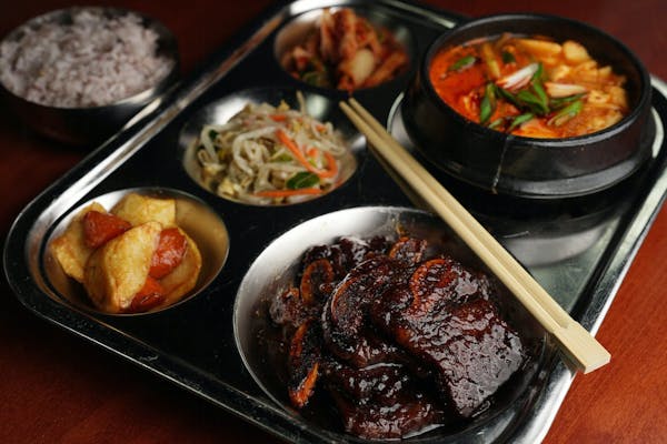 A “happy meal” at Dosirak has soondubu, ribs, purple rice and kimchi. Dosirak is one of the restaurant at Asia Mall in Eden Prairie.