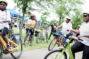 Rose Yarns, 73, second from right, participated in a group bike ride at the Twin Cities Juneteenth festival at North Mississippi Regional Park in Minn