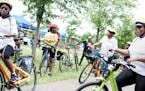 Rose Yarns, 73, second from right, participated in a group bike ride at the Twin Cities Juneteenth festival at North Mississippi Regional Park in Minn