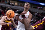 Maryland’s Julian Reese was fouled by the foot of the Gophers’ Pharrel Payne during the second half of the Terrapins’ 70-54 victory in the Big T