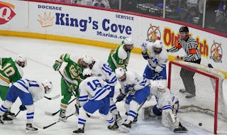 A tense battle at the net defined the Class 2A championship game between Edina and Minnetonka — a fitting end to a stellar boys hockey state tournam