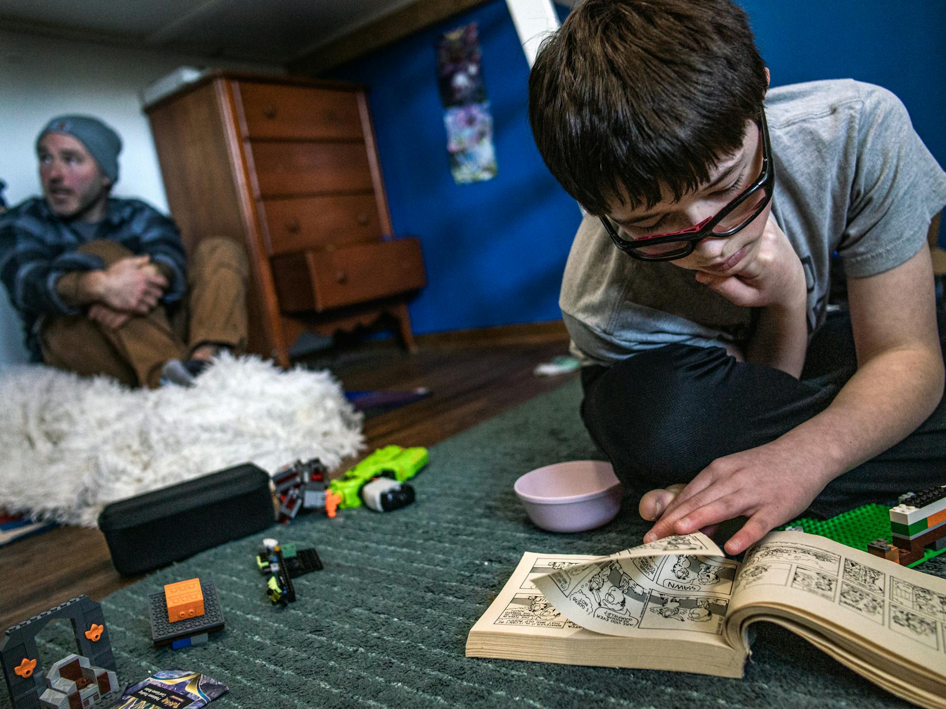 Harrison, 13, hung out with his dad, Chris Bolchen, at home in West St. Paul. Harrison loves Legos, Pokémon and comic strips, which he likes to share to make people laugh.
