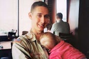 Rich Edenfield with his daughter, Jade, while home on a two-week pass during his deployment to Iraq in 2003 and 2004. It was the first of his three de
