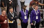 Vikings General Manager Kwesi Adofo-Mensah, second from right, spent most of Wednesday morning observing the Gophers’ pro day, but he has been busy 
