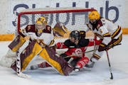 Gophers goalie Skylar Vetter has a 1.82 goals-against average, and Madeline Wethington, right, is a key member of the team’s defensive corps.