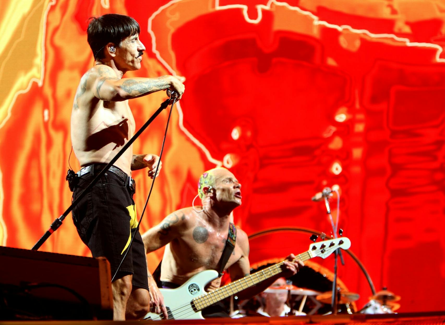 Anthony Keidis, left, and Flea of the Red Hot Chili Peppers headline 2023’s first stadium concert.