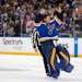 St. Louis Blues goaltender Jordan Binnington reacts after receiving a penalty during the second period against the Wild.