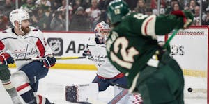 Wild winger Matt Boldy (12) scored his second goal of the first period as he shot the puck past Capitals goaltender Charlie Lindgren on Sunday.