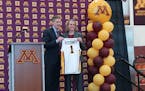 Gophers AD Mark Coyle introduced new women’s basketball coach Dawn Plitzuweit on Monday at the Athletes Village.