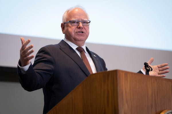 Gov. Tim Walz speaks at a news conference on the budget forecast in February.