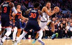 Wolves forward Kyle Anderson drove against Knicks forward Julius Randle (30) on Monday, but Randle did his damage at the other end. He scored 57 point