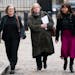 Baroness Louise Casey, center, arrives at the Queen Elizabeth II Conference Centre, London, Monday March 20, 2023, with members of the review team, Sa