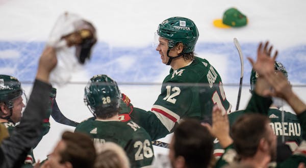 Fans at Xcel Energy Center threw hats on the ice to celebrate Wild left winger Matt Boldy’s hat trick in the third period against the Capitals on Su
