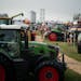 Folks gathered to talk and get a look at the equipment offerings at Ziegler Ag Equipment, Farmfest 2021. 
