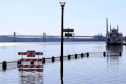 A walkway was under water along the St. Croix River during spring flooding in 2020 in Stillwater.