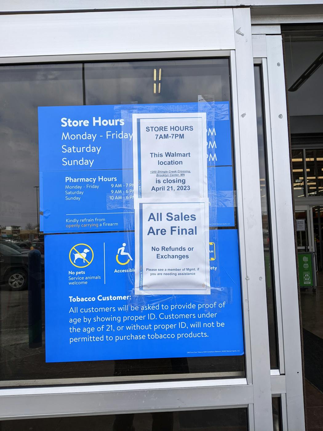 A sign posted on Walmart’s sliding entry doors informed incoming customers of its impending closure. 