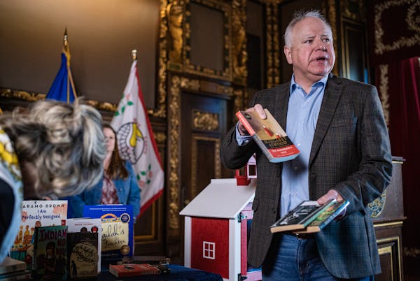 Gov. Tim Walz discussed some of the books banned elsewhere that are going into the Little Free Library outside his office, on Wednesday, March 22, at 
