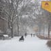 Students make their way across a snowy University of Minnesota campus in Minneapolis.
