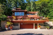 The Fountain City house in The Driftless Area of Wisconsin is built into a bluff and overlooks the Mississippi River Valley. The house was designed so