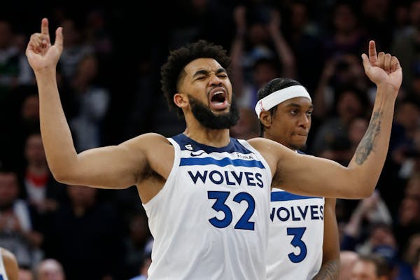 Karl-Anthony Towns celebrates his free throws to give his team the lead over the Atlanta Hawks with 3.6 seconds left in the fourth quarter.