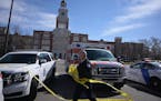 Police investigate at East High School in Denver, after a shooting there on Wednesday, March 22, 2023. Police said a student shot two adult male facul