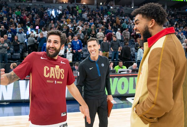Karl-Anthony Towns greeted former teammate Ricky Rubio when the Timberwolves played Cleveland while Towns was sidelined. Wolves assistant Pablo Prigio