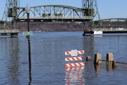 A walkway was under water along the St. Croix River during spring flooding March 31, 2020, in downtown Stillwater.