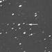 This photo provided by Gianluca Masi shows asteroid 2023 DZ2, indicated by arrow at center, about 1.8 million kilometers (1.1 million miles) away from