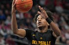 DeLaSalle’s Nasir Whitlock drove for a basket, part of his 27-point game against Orono.