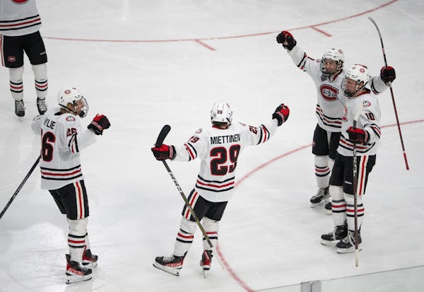 St. Cloud State forward Veeti Miettinen (29) was congratulated by his linemates after his second-period goal in a 4-0 victory over Minnesota State Man