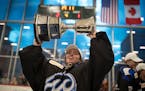 Minnesota Whitecaps goalie Amanda Leveille hoisted the Isobel Cup on March 17, 2019 at Tria Rink in St. Paul.