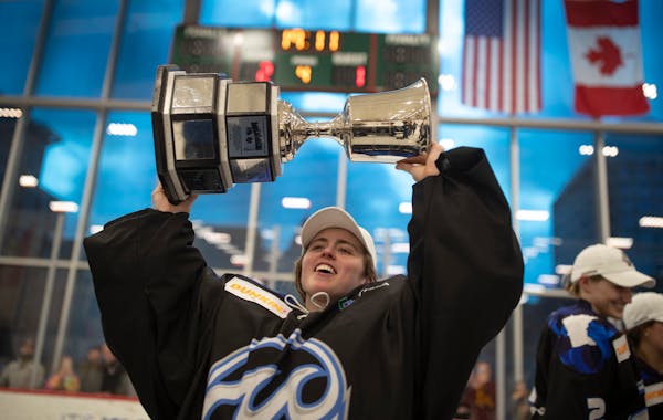 Minnesota Whitecaps goalie Amanda Leveille hoisted the Isobel Cup on March 17, 2019 at Tria Rink in St. Paul. She and her teammates will try to win an