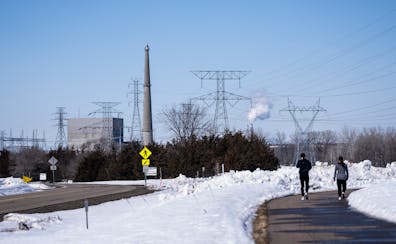 A walking trail at the Montissippi County Park gives a distant view of the Xcel Energy generating nuclear plant in Monticello.