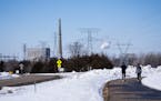 A walking trail at the Montissippi County Park gives a distant view of the Xcel Energy generating nuclear plant in Monticello.