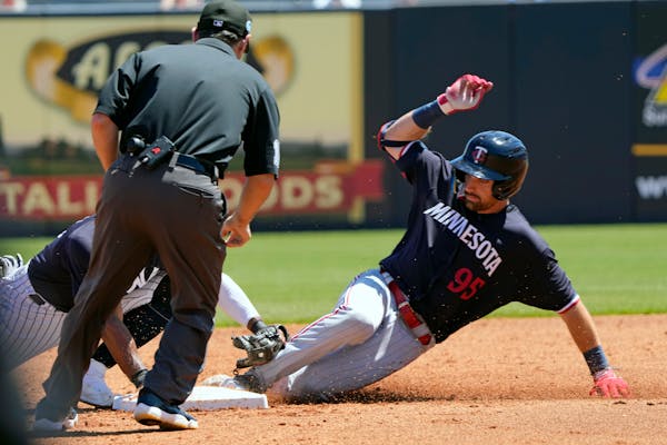 Edouard Julien of the Twins was tagged out at second by Wilmer Difo of the Yankees trying to stretch a single on Friday in Tampa, Fla. 