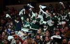 Minnesota Wild fans celebrate after a penalty is called against the New York Rangers during the second period Thursday, Oct. 13, 2022 at the Xcel Ener