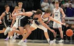Dilworth-Glyndon Felton guard Owen Leach, left, and Albany guard Tysen Gerads raced for a loose ball in the first half. 