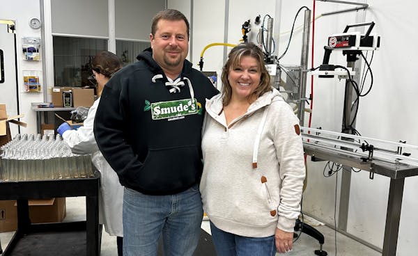 Tom and Jenni Smude at their plant in Pierz, Minn. They have diversified and grown their primary sunflower oil business, plus beef and most recently w