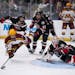 Gophers forward Mason Nevers  was dropped to the ice with a trip by St. Cloud State forward Grant Cruikshank in the first period Saturday night in Far